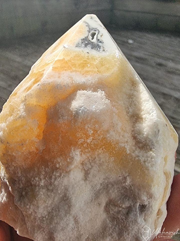Orange Calcite cut base point